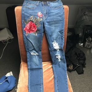 Rose embroidered/distressed jeans